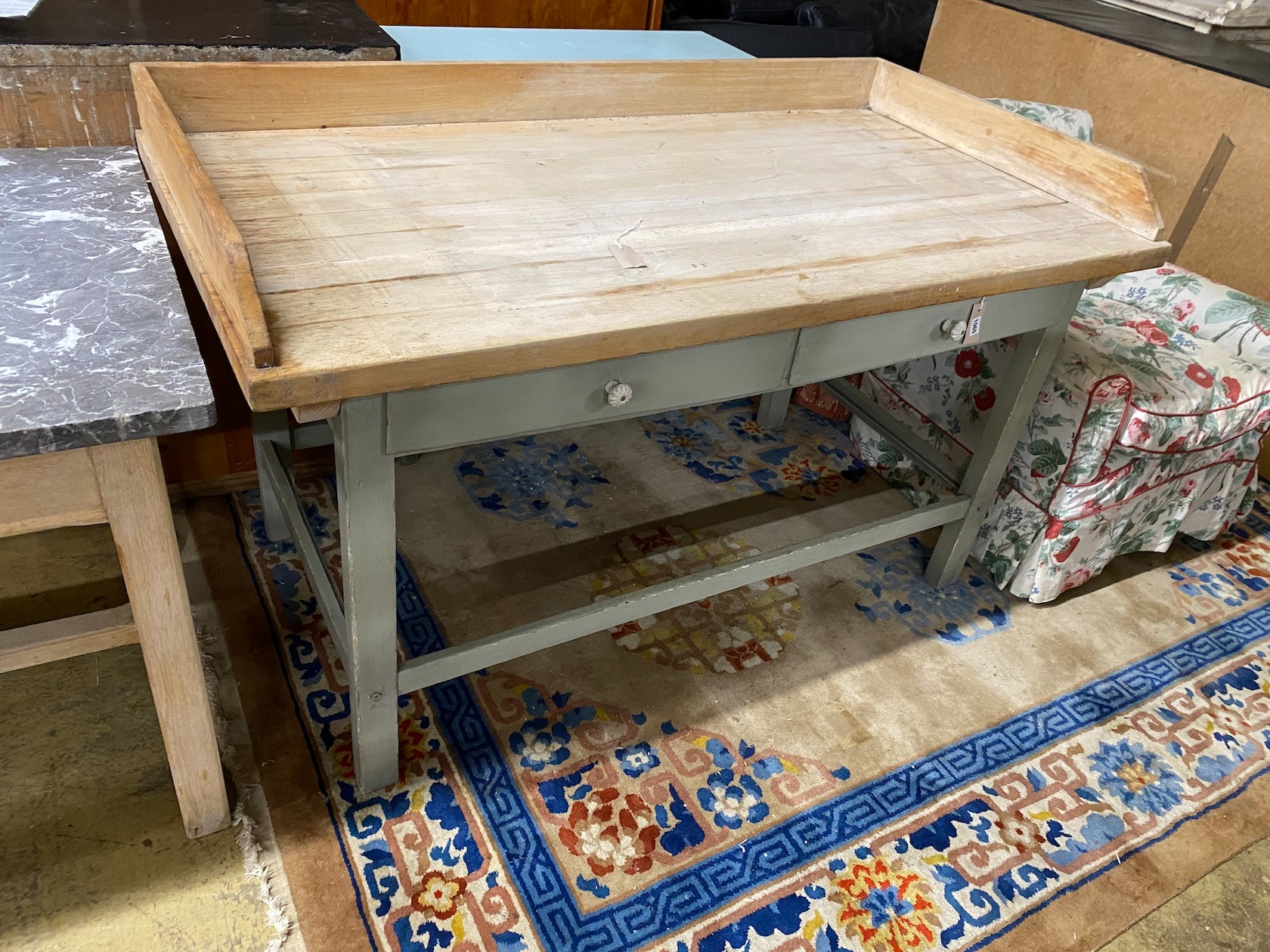 A late 19th / early 20th century part painted pine kitchen table with galleried top, length 150cm, depth 80cm, height 91cm